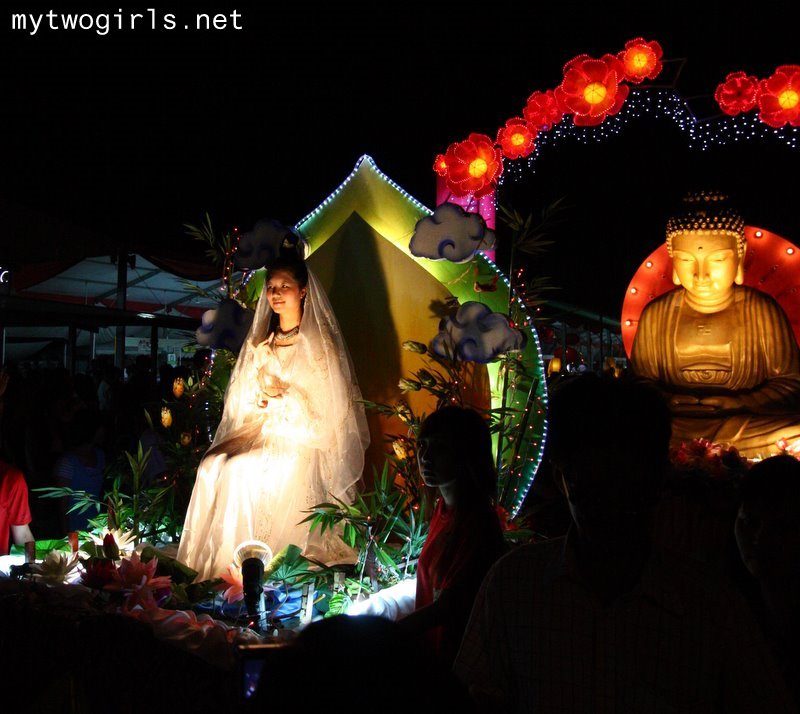 Guan Yin and Budha statue in mini Parade